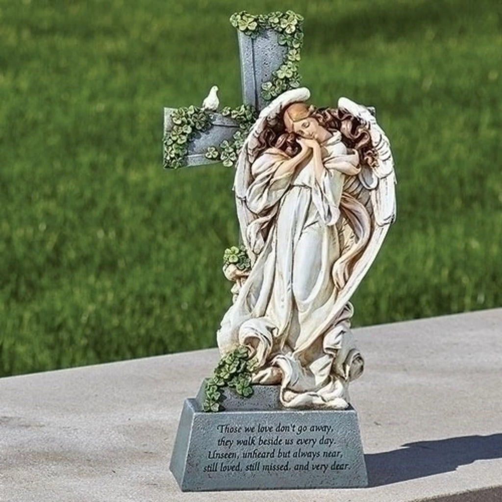 Irish angel at cross memorial garden or gravesite statue